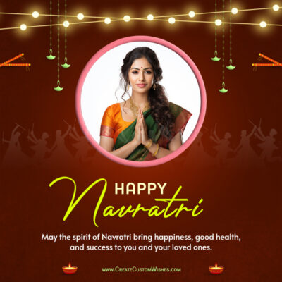 Navratri 2026 Photo Wishes Maker | Create Custom CardsPortrait of a smiling woman in a green-orange sari with folded hands (Namaste), framed in a pink circle on a festive brown background with string lights; text says 'Happy Navratri' and a Navratri greeting message.